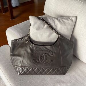 Chanel Lamb skin should’ve back zipper closure silver details chocolate color